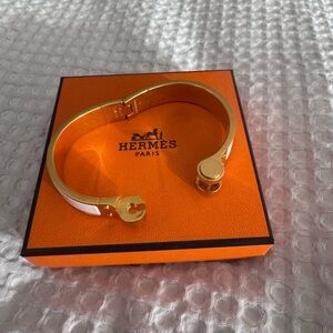 Hermes Hinged Bracelet. With original stickers on portions of the bracelet
